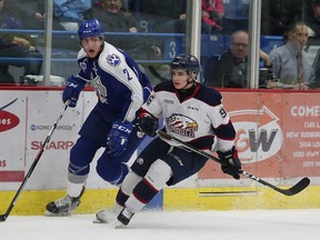 Damien Giroux, right, of the Saginaw Spirit, in OHL action against the Sudbury Wolves in Sudbury, Ont. on Friday January 20, 2017. John Lappa/Sudbury Star/Postmedia Network