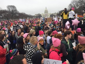 Demonstrators arrive on the National Mall in Washington, DC, for the Women's march on January 21, 2017. Hundreds of thousands of protesters spearheaded by women's rights groups demonstrated across the US to send a defiant message to US President Donald Trump. / AFP PHOTO / Andrew CABALLERO-REYNOLDSANDREW CABALLERO-REYNOLDS/AFP/Getty Images  US-POLITICS-TRUMP-INAUGURATION-PROTEST
ANDREW CABALLERO-REYNOLDS