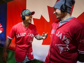 Marcus Stroman, left, and Ryan Goins have some fun listening to some music during the Blue Jays Winter Tour in Toronto on Friday, January 20, 2017. (Craig Robertson/Toronto Sun)