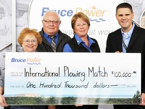 Cathy Lasby, left, executive director of the Ontario Plowman’s Association; Graeme Craig, sponsorship chair of the International Plowing Match (IPM) and Rural Expo; and Jacquie Bishop, chair of 2017 IPM, receive a $100,000 cheque from James Scongack, Bruce Power’s vice president of Corporate Affairs and Environment. Bruce Power is a Distinguished Partner of the IPM, which will take place in Walton, Huron County, from Sept. 19-23. It is expected to draw 100,000 people to Walton.