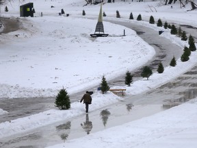 Warm weather has closed the river trail in Winnipeg. Large puddles of water are visible along the skating trail. Saturday, January 21, 2017. (Winnipeg Sun/Postmedia Network)