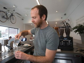 Fred Sztabinski, former transportation planner for Metrolinx, has changed careers and opened Fix Coffee + Bikes on Gladstone Ave. (Stan Behal/Toronto Sun)