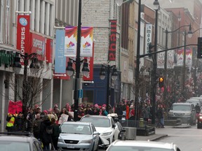 The Kingston Women's March make their way down Princess Street to gather in Springer Market Square in Kingston, Ont. on Saturday Jan. 21, 2017. Steph Crosier, Kingston Whig-Standard, Postmedia Network