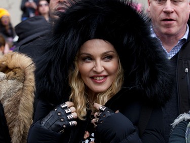 Madonna smiles before she performs during the Women's March on Washington, Saturday, Jan. 21, 2017 in Washington. (AP Photo/Jose Luis Magana)