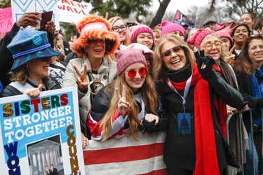 Gloria Steinem, center right, greets protesters at the barricades before speaking at the Women's March on Washington during the first full day of Donald Trump's presidency, Saturday, Jan. 21, 2017 in Washington.  (AP Photo/John Minchillo)