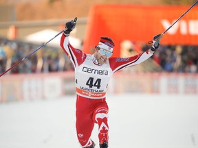 Alex Harvey crosses the finish line to win the men's 15 km freestyle competition at the FIS Cross Country skiing World Cup event in Ulricehamn, Sweden, on Saturday Jan. 21, 2017. (Adam Ihse/TT via AP)