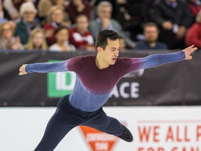 Patrick Chan gets some air during his free program at the national skating championships at TD Place in Ottawa last night. Chan won his ninth Canadian title. (Wayne Cuddington/Postmedia Network)
