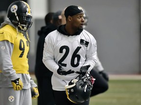 Pittsburgh Steelers linebacker James Harrison, left, and running back Le’Veon Bell take part in a practice Friday, Jan. 20, 2017, in Pittsburgh. (Matt Freed/Pittsburgh Post-Gazette via AP)