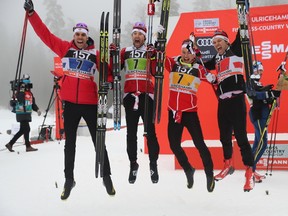 Canada's (from left to right) Len Valjas, Alex Harvey, Knute Johnsgaard and Devon Kershaw celebrate their third place finish in men's relay 4x7.5 km competition at the FIS Cross Country skiing World Cup event in Ulricehamn, Sweden, on Sunday Jan. 22, 2017. (Adam Ihse/TT via AP)