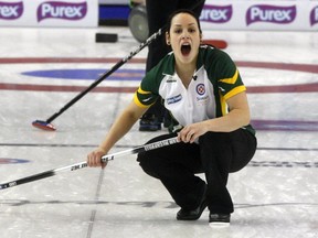 Kendra Lilly, third for Krista McCarville's Northern Ontario rink, yells to "sweep" in the Scotties Tournament of Hearts gold medal game on Sunday February 28, 2016 at Revolution Place in Grande Prairie, Alta. Lilly and her teammates are heading back to the Scotties after winning a second straight Northern Ontario title Saturday over Sudbury's Fleury rink. Logan Clow/Grande Prairie Daily Herald-Tribune/Postmedia Network