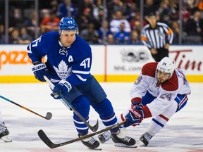 Maple Leafs forward Leo Komarov in action against Canadiens' Phillip Danault at the Air Canada Centre in Toronto on Jan. 7, 2017. (Ernest Doroszuk/Toronto Sun)