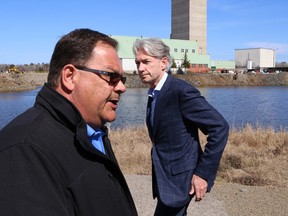 Roger Breau, left, of Taurus Drilling Services, and Thomas Boehlert, president and CEO of First Nickel Inc. hold a press conference at First Nickel's Lockerby Mine on May 6, 2014, following the death of two Taurus workers at the mine. (John Lappa/Sudbury Star file photo)