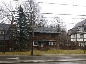 Textbook is taking legal action against the Upper Thames River Conservation Authority because the Vaughan-based developer was denied a permit to build a 15-storey condo on the site of these six homes on Richmond Street. (MORRIS LAMONT, The London Free Press)