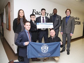 Laurentian University business students, from left, Keandra Beauvais, Yuxin Ran, Eric Lavergne-Giroux, Kevin Konate, Curtis Byron and Jean Noel Desmarais, along with coach Luc Lagrandeur, will represent Canada in a business case competition in China. (Gino Donato/Sudbury Star)