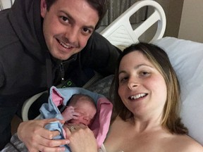 : The happy parents Mark and Amanda Van Dieten holding their newborn baby boy Henricus “Henry” David Van Dieten, who was born on Jan. 6.(Submitted photo_