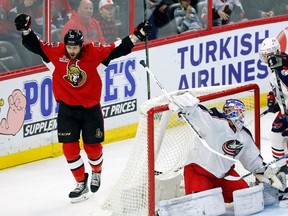 Senators’ Zack Smith celebrates one of his two goals against Columbus Blue Jackets goaltender Joonas Korpisalo last night. (THE CANADIAN PRESS)