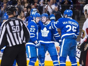 Leafs centre Tyler Bozak (centre) tied Red Kelly’s goal total at 119. (The Canadian Press