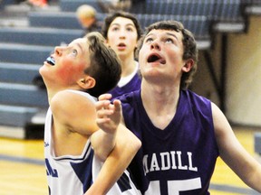 Curt Eidt (left) of the MDHS junior basketball team. ANDY BADER MITCHELL ADVOCATE