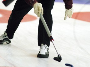 Dave Meyskens releases his rock with a stick, during the 32nd annual All-Ontario Farmers' Bonspiel held at the Sydenham Community Club on Sunday, January 22. Meyskens' team won the B-flight final on Sunday afternoon.