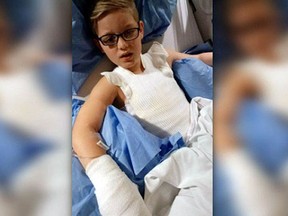 Eight-year-old James Ditucci is pictured in Boston hospital with serious burns in this photo posted on Twitter. (Handout/Postmedia Network)