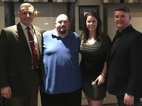 Submitted photo
Belleville Police Chief Ron Gignac, left, stands with Quinte Crime Stoppers chairman Mike Letwin, vice-chair Lisa Anne Chatten and Deputy Chief Mike Callaghan at the Quinte Crime Stoppers dinner in Belleville, Ont. Sunday, Jan. 22, 2017. The officers spoke highly of Crime Stoppers, which last year aided in the resolution of 40 cases.