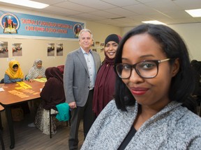 From left: board chairman Bob Walker, executive director Sahra Hashi and vice chair Saharla Aden, of Somali Canadian Women and Children's Association centre on  January 23, 2017.