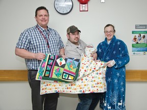 The new addition to the Galbraith family was presented with a handmade quilt from the Pincher Creek Quilters on Jan. 19. | Caitlin Clow photo/Pincher Creek Echo