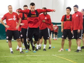 Toronto FC forward Sebastian Giovinco, centre, takes part in a drill during MLS opening day training camp in Toronto on Tuesday, January 24, 2017. THE CANADIAN PRESS/Nathan Denette
