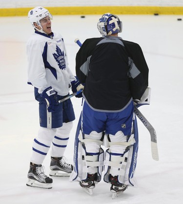 Toronto Maple Leafs Auston Matthews C (34) with teammate Frederik Andersen G (31) at practice as they prepare for their game Wednesday night in Detroit in Toronto on Tuesday January 24, 2017. Jack Boland/Toronto Sun/Postmedia Network