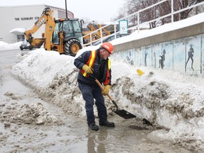The city will clear more sidewalks and spend more money on winter sidewalk clearing this coming winter. (File photo)