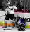Anaheim Ducks' Joseph Cramarossa (74) skates to the puck after hitting Winnipeg Jets' Brandon Tanev (13) during first period NHL hockey action in Winnipeg, Monday, January 23, 2017. THE CANADIAN PRESS/Trevor Hagan