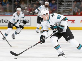 Tommy Wingels of the San Jose Sharks advances the puck against the Colorado Avalanche at the Pepsi Center on Jan. 23, 2017 in Denver. (Matthew Stockman/Getty Images)