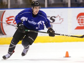 Alex Formenton of the Knights rounds a pylon during a hard skating workout at Budweiser Gardens on Tuesday January 24, 2017. (MIKE HENSEN, The London Free Press)