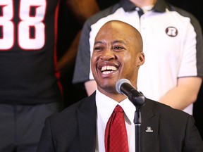 Ottawa Redblacks CFL football quarterback Henri Burris smiles as he announces his retirement. JEAN LEVAC/POSTMEDIA