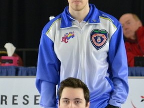 B.C. skip Tyler Tardi looks over shoulder of Northern Ontario skip Tanner Horgan during their game on Tuesday morning. (Photo, Curling Canada/Al Cameron