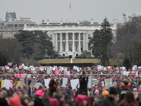Demonstrators protest near the White House in Washington, DC, for the Women's March on January 21, 2017. Hundreds of thousands of protesters spearheaded by women's rights groups demonstrated across the US to send a defiant message to US President Donald Trump. (ANDREW CABALLERO-REYNOLDS/AFP/Getty Images)