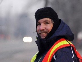 He's back. Al Welsh was back at his post as the crossing guard at the corner of Reaume and Murray Street on Monday. Chatham-Kent got rid of all the crossing guards across the municipality in December, however A. DeBot and Sons Ltd., a local agricultural business, has pledged to pay for Welsh to stay on the job as a crossing guard.