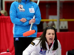 Skip Heather Nedohin, right, yells instructions against Shannon Kleibrink during the 2015 provincial curling championship in Lacombe. (Larry Wong)