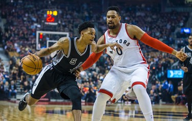 Toronto Raptors Jared Sullinger during 1st half action against San Antonio Spurs Dejounte Murray  at the Air Canada Centre in Toronto, Ont. on Tuesday January 24, 2017. Ernest Doroszuk/Toronto Sun/Postmedia Network