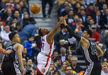 Toronto Raptors Kyle Lowry during 1st half action against  San Antonio Spurs Danny Green at the Air Canada Centre in Toronto, Ont. on Tuesday January 24, 2017. Ernest Doroszuk/Toronto Sun/Postmedia Network