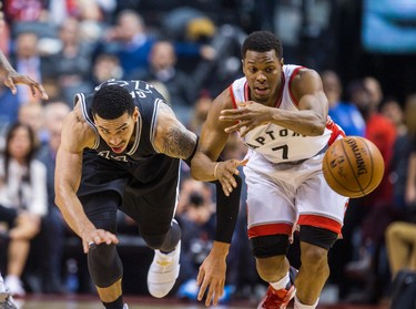 Toronto Raptors Kyle Lowry during 1st half action against San Antonio Spurs Danny Green at the Air Canada Centre in Toronto, Ont. on Tuesday January 24, 2017. Ernest Doroszuk/Toronto Sun/Postmedia Network