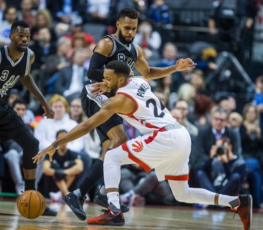 Toronto Raptors Norman Powell during 1st half action against San Antonio Spurs Patty Mills at the Air Canada Centre in Toronto, Ont. on Tuesday January 24, 2017. Ernest Doroszuk/Toronto Sun/Postmedia Network
