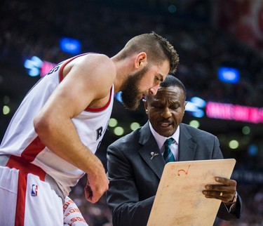Toronto Raptors Jonas Valanciunas with head coach Dwane Casey during the final second of game action against the San Antonio Spurs at the Air Canada Centre in Toronto, Ont. on Tuesday January 24, 2017. Ernest Doroszuk/Toronto Sun/Postmedia Network