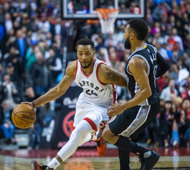 Toronto Raptors Norman Powell during 2nd half action against San Antonio Spurs Patty Mills at the Air Canada Centre in Toronto, Ont. on Tuesday January 24, 2017. Ernest Doroszuk/Toronto Sun/Postmedia Network