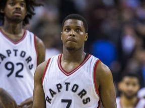Toronto Raptors Kyle Lowry and Lucas Nogueira towards the end of game action against the San Antonio Spurs at the Air Canada Centre in Toronto, Ont. on Tuesday January 24, 2017. (Ernest Doroszuk/Postmedia Network)