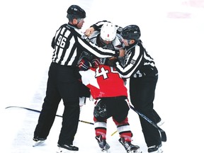 Capitals’ Alex Ovechkin and Senators’ Jean-Gabriel Pageau mix it up in Tuesday's game at the CTC (The Canadian Press)