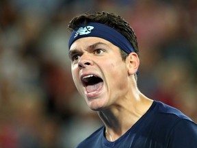 Milos Raonic of Canada reacts in his quarterfinal match against Rafael Nadal of Spain on day 10 of the 2017 Australian Open at Melbourne Park on January 25, 2017 in Melbourne, Australia. (Photo by Cameron Spencer/Getty Images)