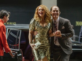 This image released by The Weinstein Company shows Bryce Dallas Howard and Matthew McConaughey, right, in a scene from, "Gold." (The Weinstein Company via AP)