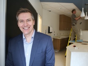 Ben Gooch, program co-ordinator of the Voices Opportunities and Choices Employment Club at Providence Care Hospital, stands in the cafe being built in the new hospital. The program is expected to employ approximately 100 people living with mental health illnesses when the hospital opens in April. (Elliot Ferguson/The Whig-Standard)