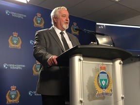 Winnipeg Crime Stoppers chair Paul Johnson speaks during a press conference at police headquarters. (DAVID LARKINS/Winnipeg Sun)